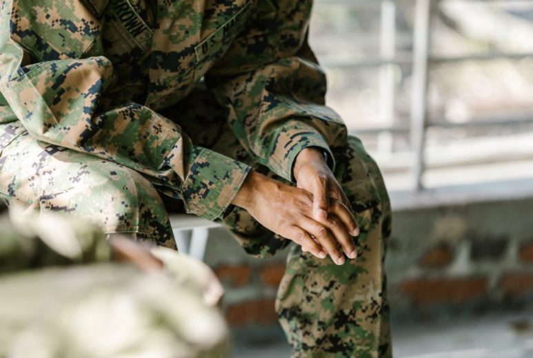 man in uniform getting military & veteran services